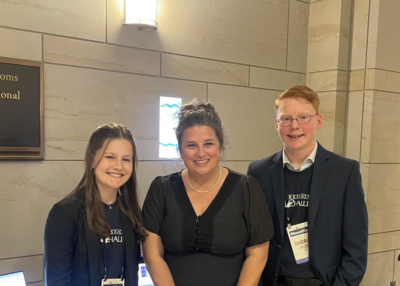 Carrie Foxhall and two of her Web students, Gabe Jacobs and Hannah Castor